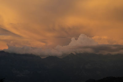 Clouds over mountain range