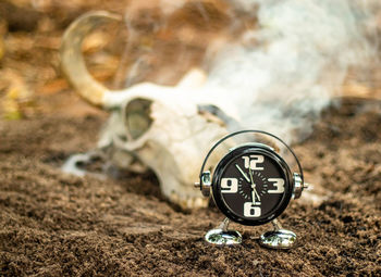 Close-up of clock on the road