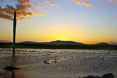 Scenic view of sunset over sea