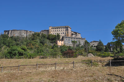 Old ruins against clear blue sky