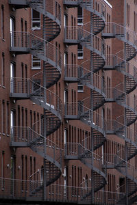 Full frame shot of modern back stairs buildings in city.