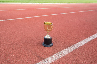 Trophy on running track
