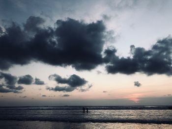 Scenic view of sea against sky at sunset