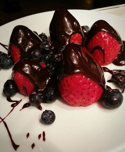 Close-up of red berries on plate
