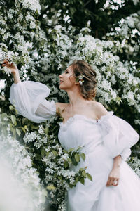 Woman holding flower bouquet