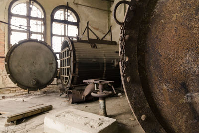 Old machine part in abandoned factory