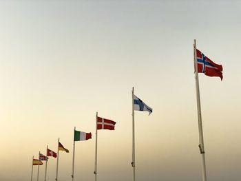 Low angle view of flag against sky