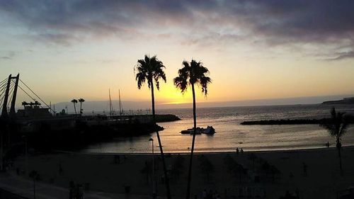 Scenic view of sea at sunset