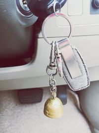 Close-up of key chain in car