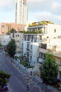 Buildings in city against sky