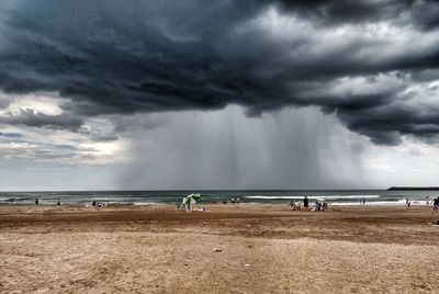 Panoramic view of people on beach