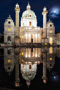 Illuminated buildings in city at night