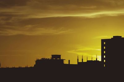 Silhouette of buildings at sunset