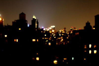 Illuminated cityscape at night