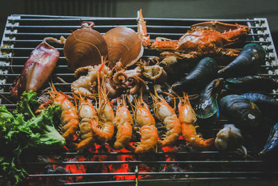 Close-up of meat on barbecue grill