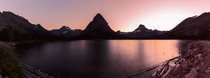 Scenic view of lake against sky during sunset