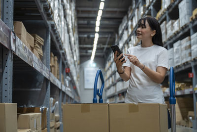 Young woman using mobile phone