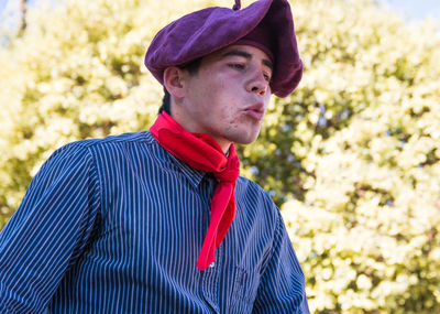 Teenager wearing south american traditional clothing