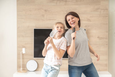 Portrait of happy mother and daughter