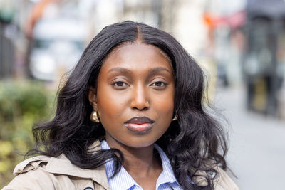 Close-up of young woman looking away