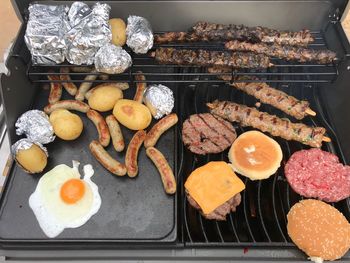 High angle view of food on barbecue