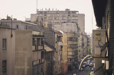 Buildings in city against sky
