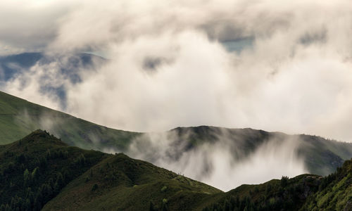 Panoramic view of waterfall against sky