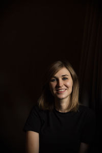 Portrait of a smiling young woman