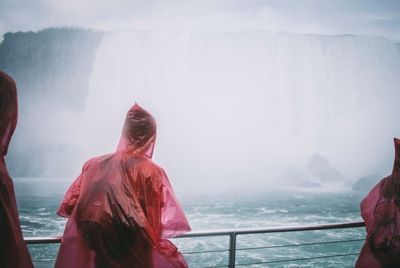 Scenic view of sea with mountain in background
