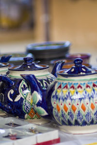 Close-up of containers on table