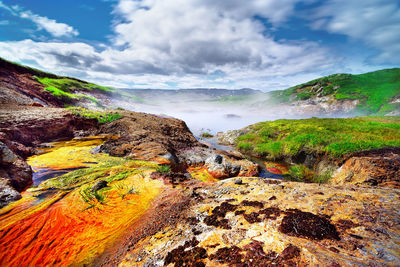 Scenic view of river against sky