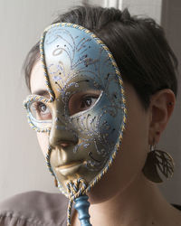 Close-up of woman with mask