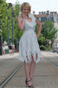 Full length portrait of woman standing 