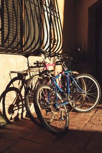 Bicycle parked against wall