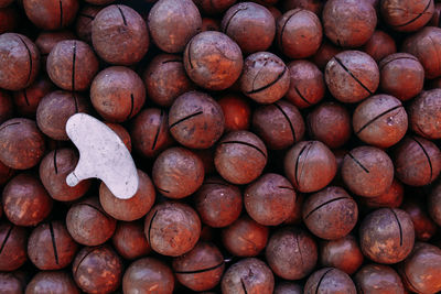 Lots of macadamia nuts on a farmer's market stall