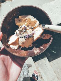 Close-up of person holding ice cream cone