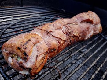 Close-up of meat on barbecue grill