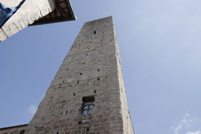 Low angle view of old building against sky