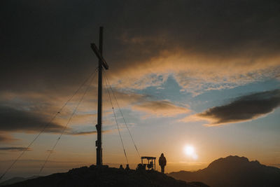 Low angle view of silhouette mountain against sky during sunset