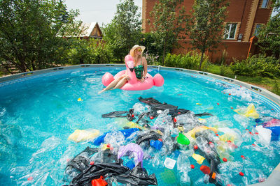 Woman swimming in pool