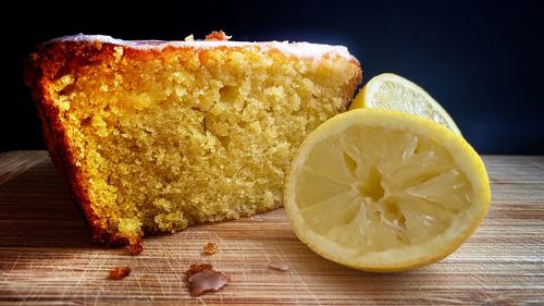 Close-up of orange slice on cutting board