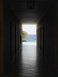 View of sea seen through window