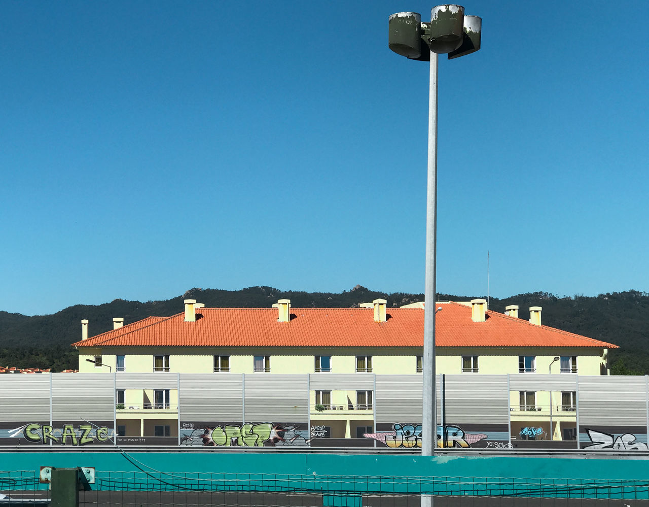 BUILT STRUCTURE AGAINST BLUE SKY