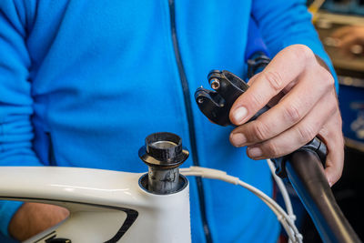 Close-up of man using mobile phone