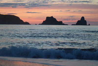 Scenic view of sea against sky during sunset