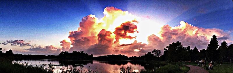 Scenic view of lake at sunset