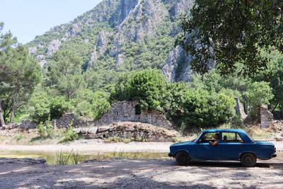 Car on road against mountain