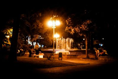 Illuminated street light at night
