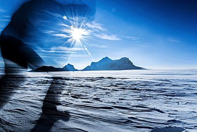 Scenic view of snowcapped mountain against sky