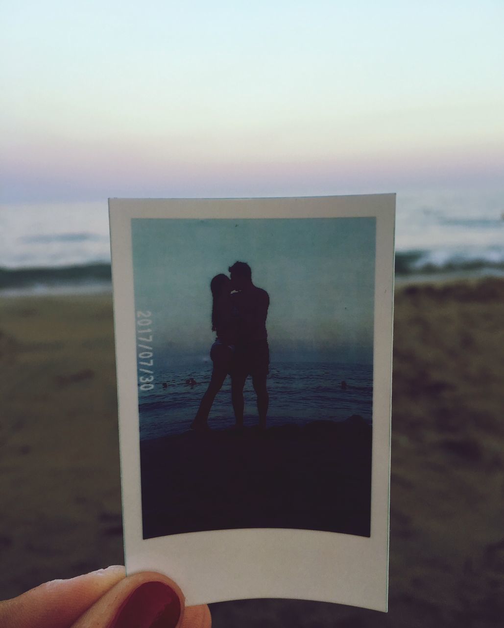 sea, beach, real people, horizon over water, water, sand, shore, sky, leisure activity, two people, human hand, lifestyles, men, nature, outdoors, scenics, day, vacations, human body part, beauty in nature, togetherness, sunset, women, photography themes, clear sky, close-up, people